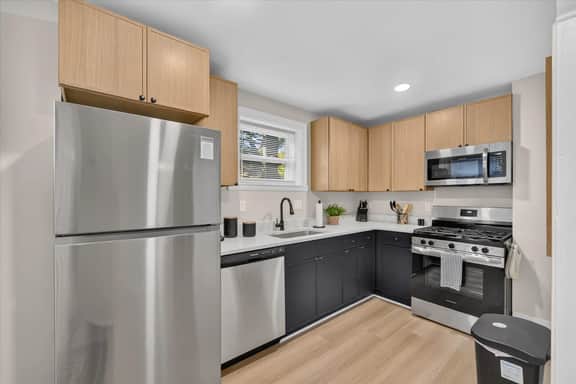 Comfort Calling | Renovated 4BR Near MSU - Image 4